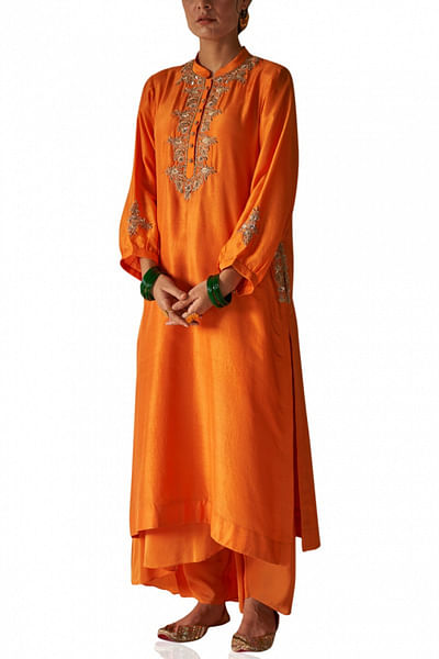 Orange kurta and dhoti salwar