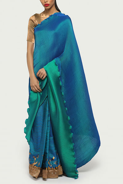 Turquoise pleated sari and blouse
