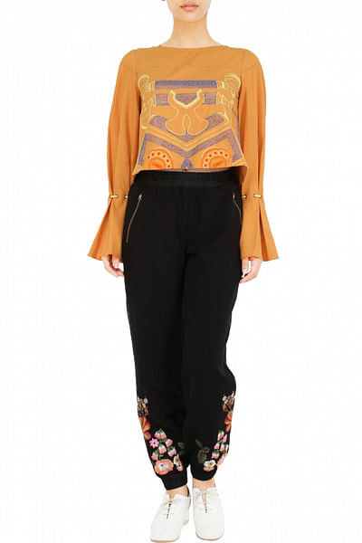 Abstract embroidered top with tie-up bell sleeves