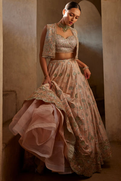 Peach embroidered jacket lehenga set