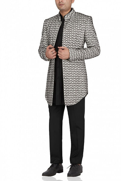 <p>Black and white bandhgala set</p>