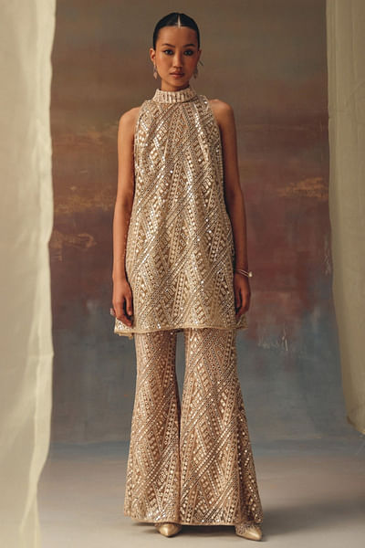 Gold embellished bell bottom pants