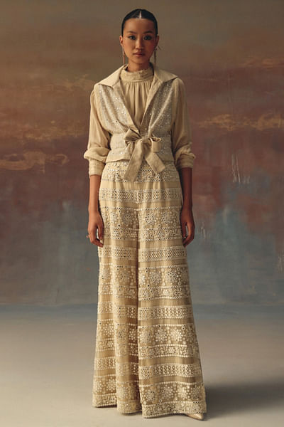Ivory embellished palazzo pants