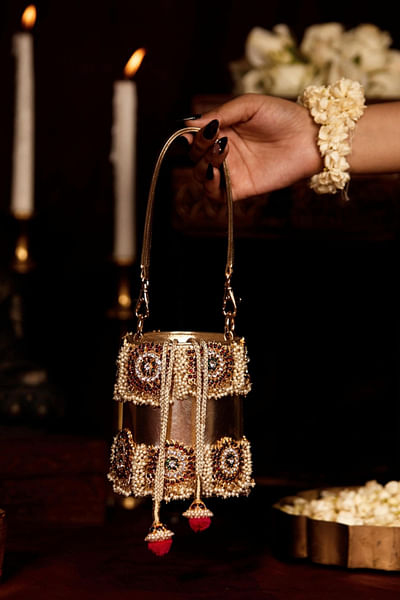 Gold stone and pearl embellished bucket bag