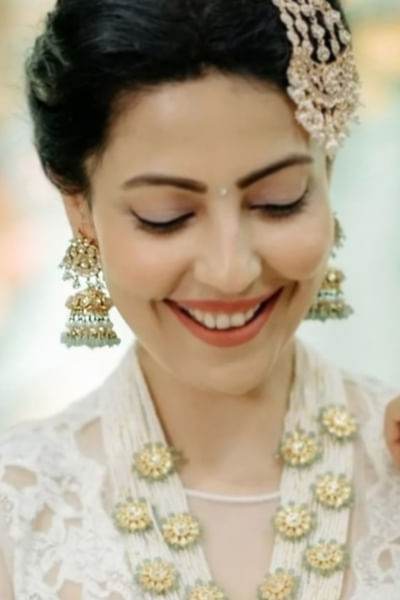 Sea green and gold jadau jhumka earrings