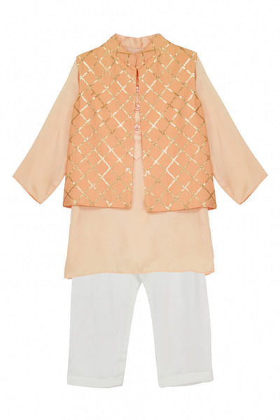 Orange kurta set and jacket