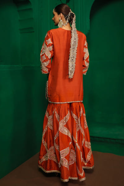 Charu Makkar Rust orange gota embroidered gharara set CHARJUL26D149450