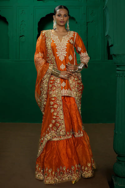Charu Makkar Rust orange aari embroidered gharara set CHARJUL26D149473