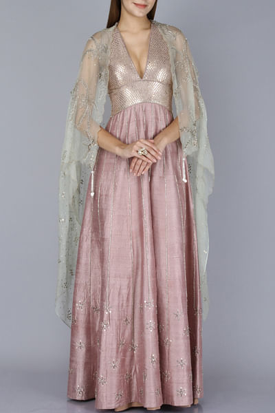 Gown with embellished cape