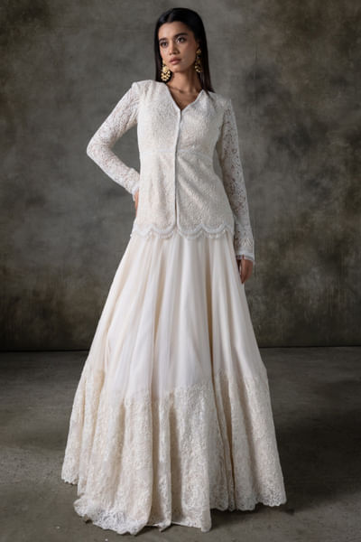White embroidered jacket lehenga set