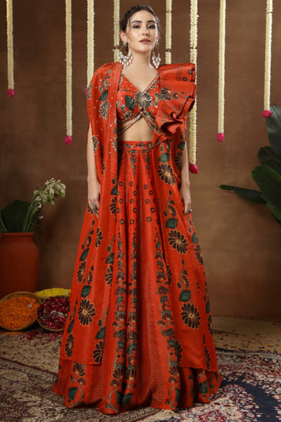 Orange print embroidered cape lehenga set