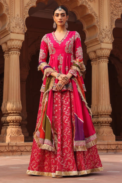 Hot pink zardozi embroidered peplum skirt set