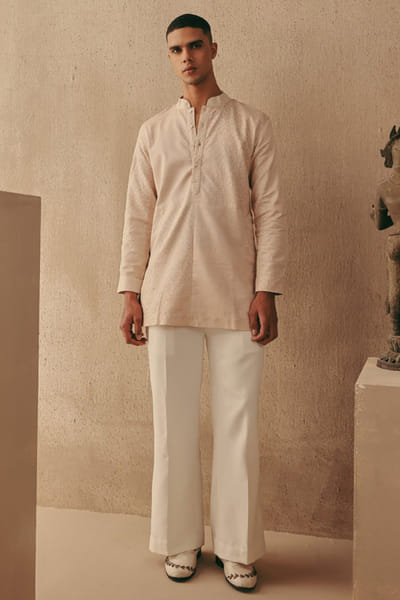 Ivory stretch crepe flared pants