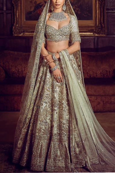 Pista green hand embroidered lehenga set