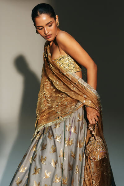 Gold hand embroidered potli bag