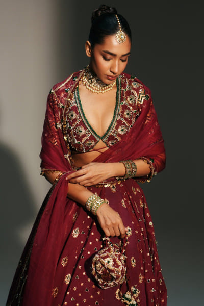 Sindoori red hand embroidered potli bag