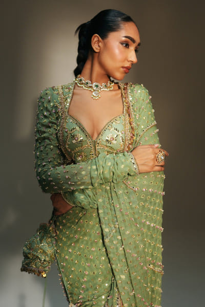 Pista green hand-embroidered potli bag