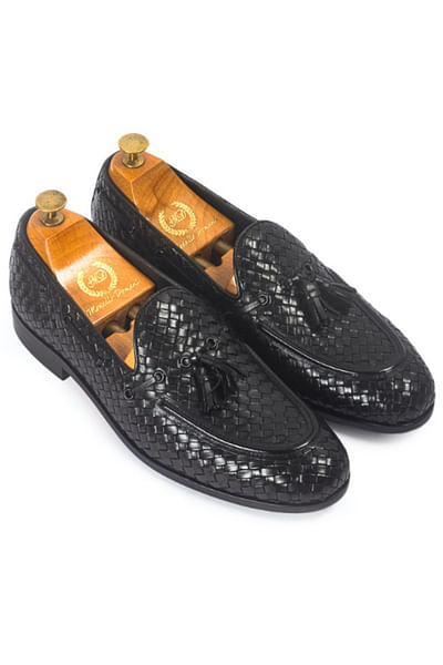Black tasselled leather slip-ons