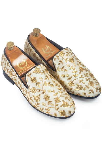 Beige floral embroidered slip-ons