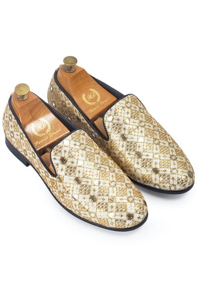 Beige embroidered leather slip-ons