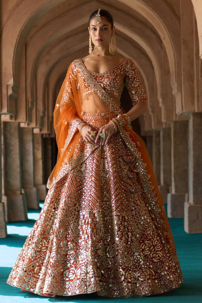 Angad Singh Rust orange mirror embroidered lehenga set ANGAMAY26D145411