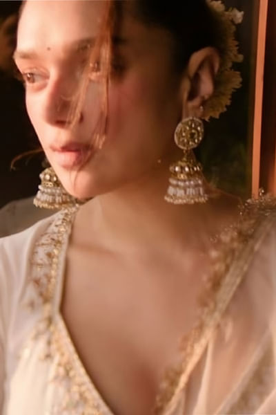 Gold and white kundan jadau jhumka earrings