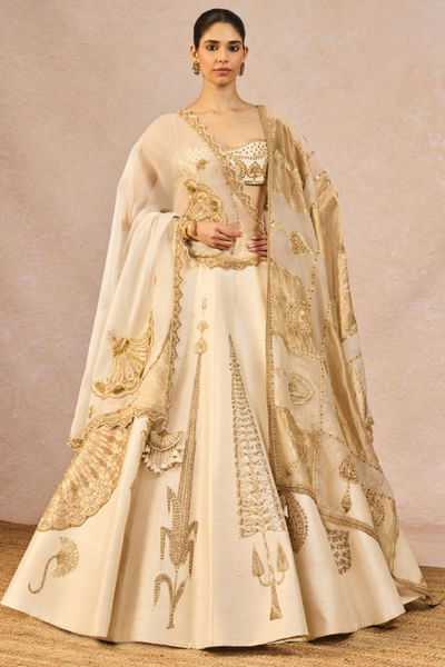 Ivory and gold motif embroidered lehenga set