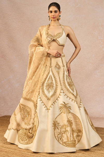 Ivory and gold embroidered jacket lehenga set