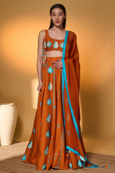 Orange embroidered raw silk lehenga set