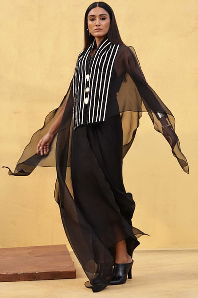Black embroidered cape and draped jumpsuit