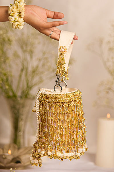 Gold bead tasselled cylindrical bucket bag