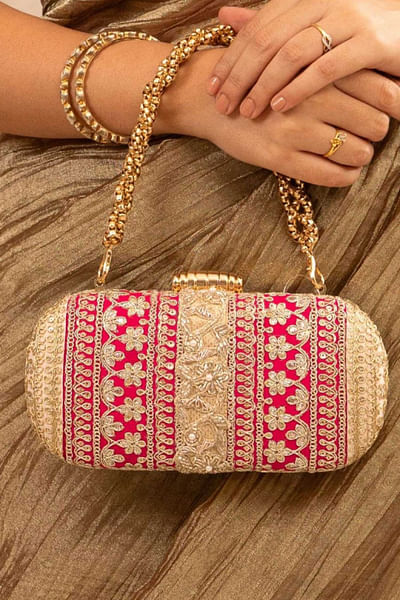 Pink and peach embroidered clutch