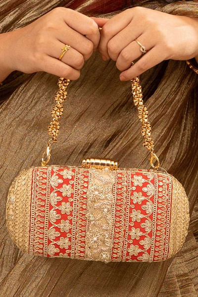 Red and orange embroidered clutch