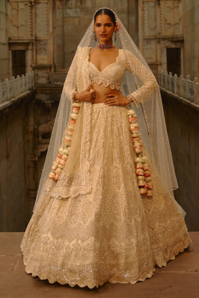 Nitika Gujral Ivory sequin-cutdana embroidered lehenga set NITNOV25D137454