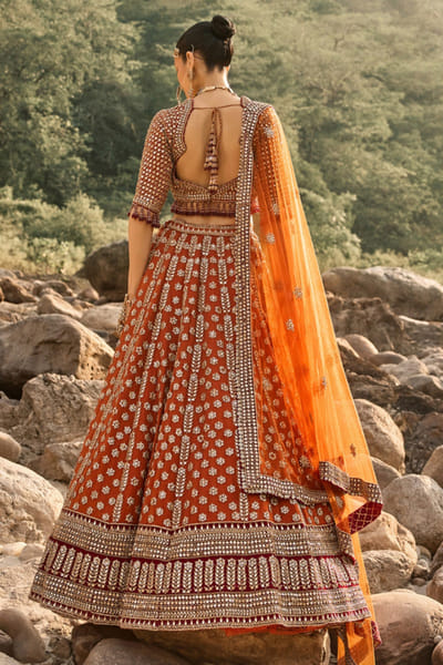 Nitika Gujral Rustic amber floral zardozi lehenga set NITIAUG26D152407