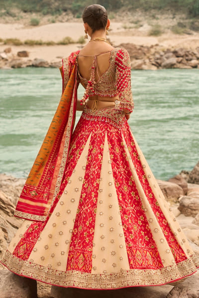 Nitika Gujral Red and gold patola lehenga set NITIAUG26D152419