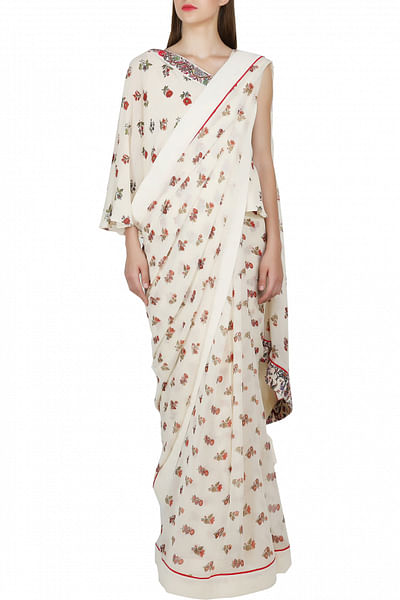 Ivory one-shoulder crepe blouse with georgette sari