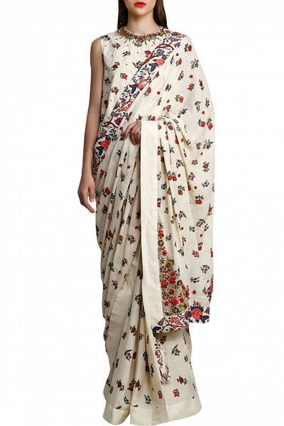 Ivory embellished sari with peplum khaadi top