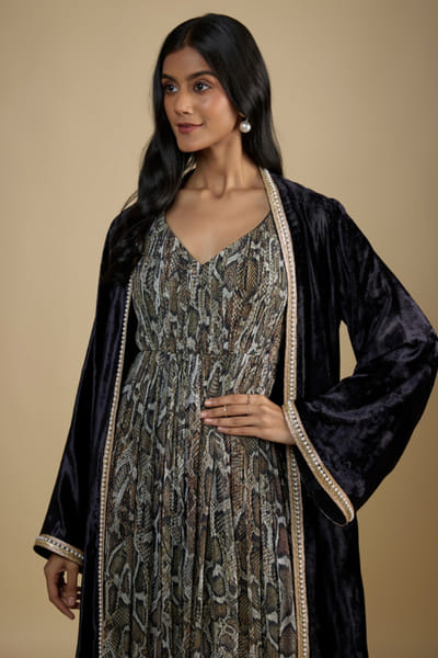 Black velvet cape and printed dress