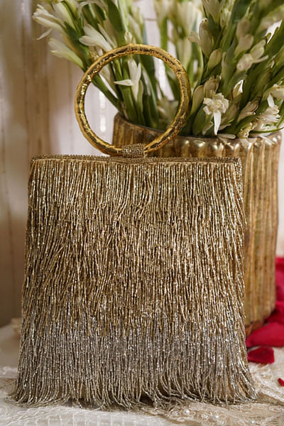 Gold fringe embellished square clutch