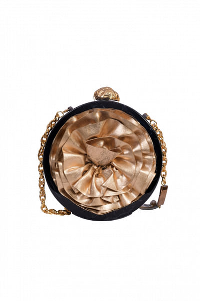 Round clutch with faux leather flower