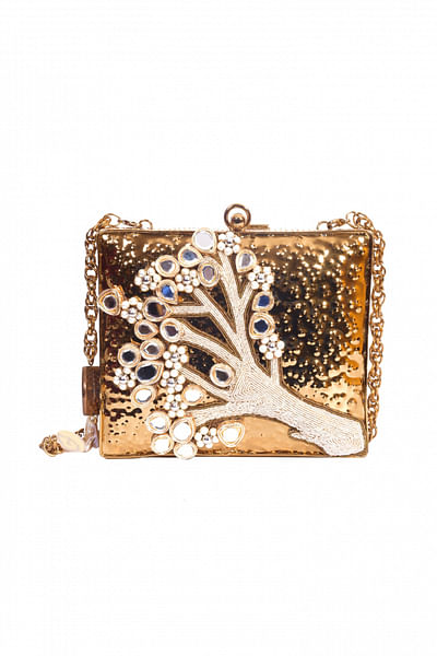 Gold clutch with embellishments