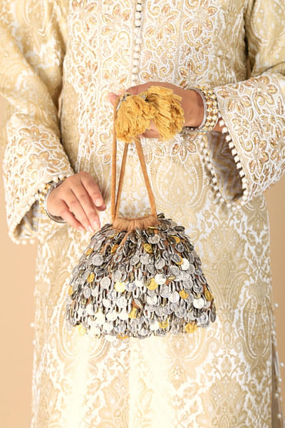 Gold coin and shell embellished potli bag