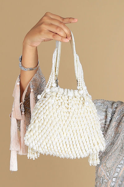 Cream pearl tasselled potli bag