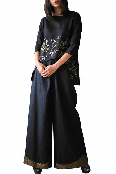 Black linen crescent top with sequin bamboo embroidery