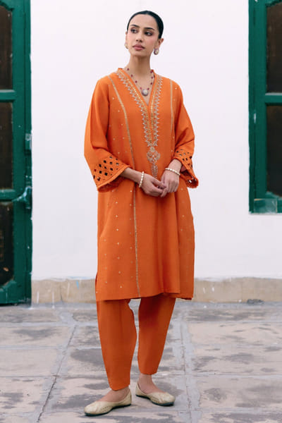 Pink City by Sarika Orange embroidered kurta and dhoti set PINKJUN26D146334