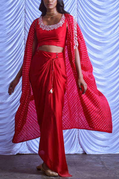 Red draped skirt and cape set