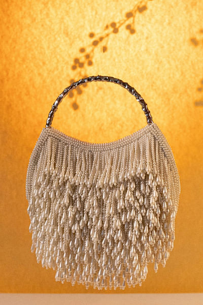 Ivory pearl tassel embroidered potli bag