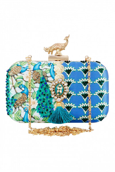 Clutch with statement brooch