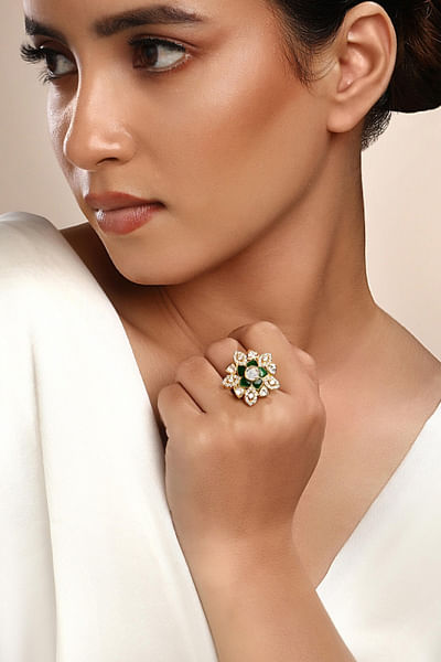 Gold and green moissanite and zirconia ring